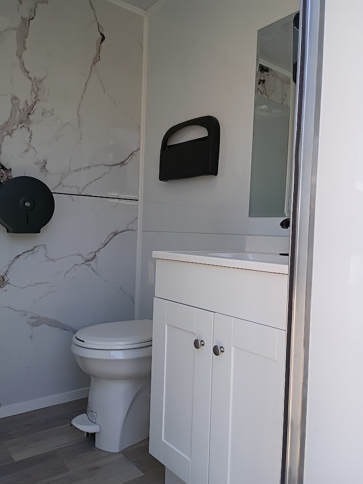 Marble stall interior with modern fixtures