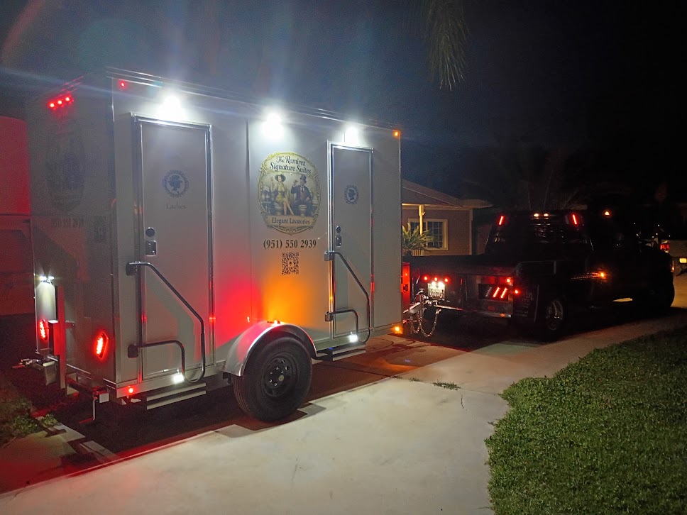 Trailer illuminated at night at an evening celebration